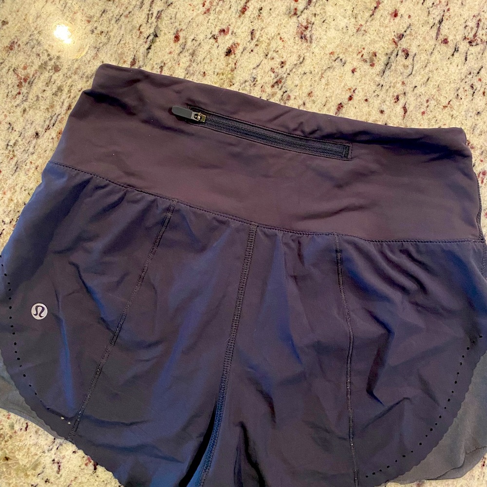 Lululemon size4 gray shorts with back zipped pocket